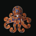 Decorative Blue Ring Octopus with orange and blue pattern on a black background